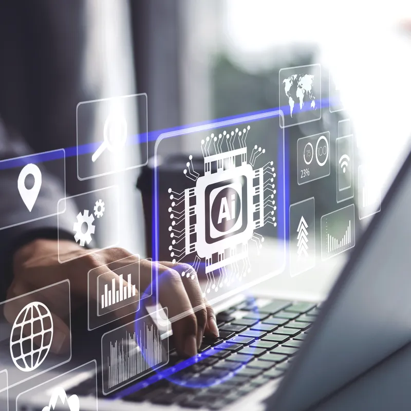 Hands interacting with a laptop, surrounded by digital marketing and AI icons, symbolizing Answer Engine Optimization (AEO) efforts.